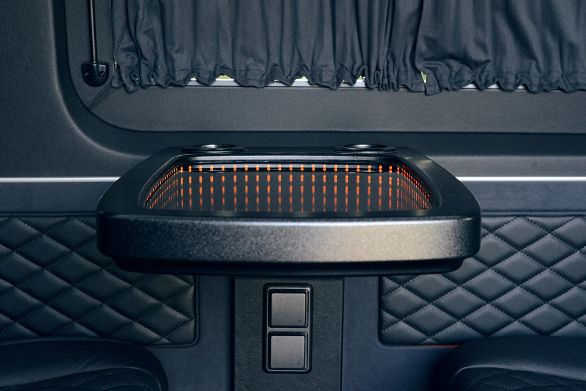 Vehicle interior view of a motorhome Modern Area Inside the luxury van. Table inside modern car
